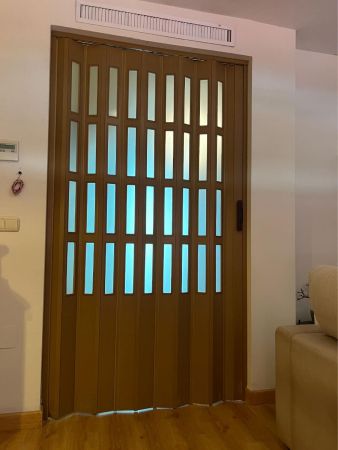 puerta plegable pvc cristalera
